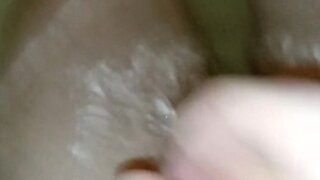 Man masturbates and ejaculates on hands