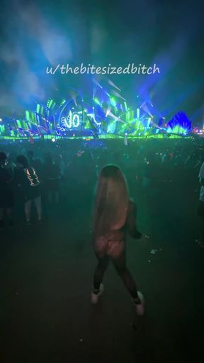 Raver girl dances sexily at rave
