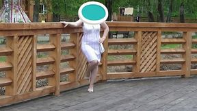 milf in the park flashing her pussy on a bench