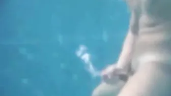 Straight twink jerks off underwater and cums outdoors