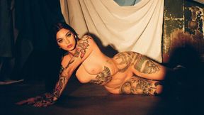 Taylor reveals her tattoo covered body