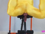 Muscle man playing in full zentai suit