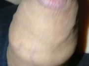 Grower slowly erects, no hands flaccid, foreskin with pre-cum drop at end.