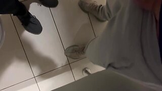 A straight guy got caught jerking his cock in the public toilet