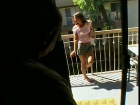 Gorgeous thin brunette Liza Harper strokes a cock with her feet after giving blowjob