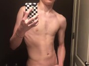19 year old college guy wearing glasses jerks of in the mirror