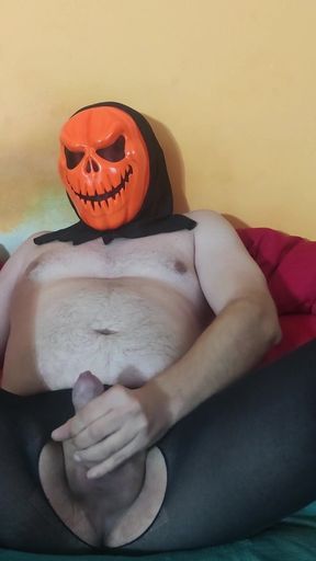 Man in Halloween Mask and Nylon Tights Pleasuring Himself...