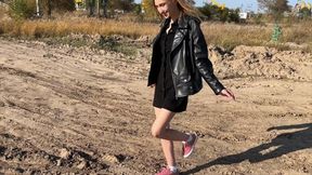 girl in sneakers and white socks walks through dirty puddles (reissue)