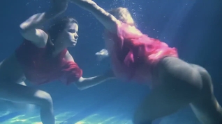 Lilia Mihalkova and Natalia Kupalka underwater lesbians