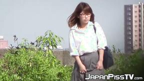 ”Japanese lady finds a secluded place to pee in public space”