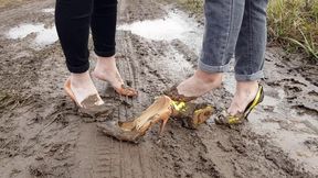 louboutin in mud, two girls in mud, high heels wrecked, muddy high heels, shoes in mud, muddy feet