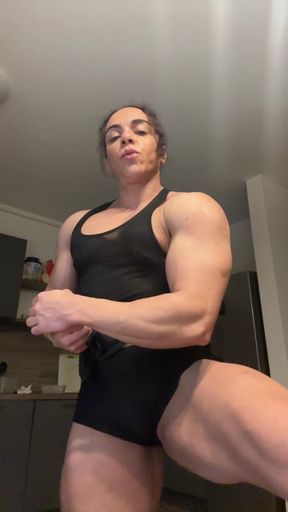 Female bodybuilder in black tank top