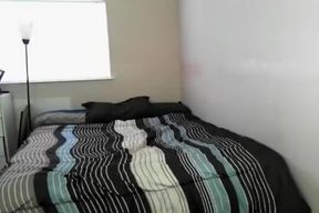 Travis strips out of his suit