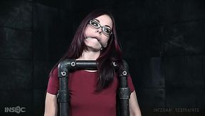 Nerdy redhead Ivy Addams takes a chance in BDSM workout