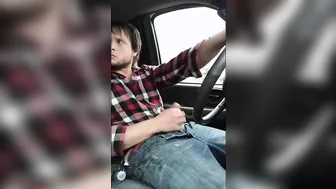 Muscular twink jerks his big cock in a van