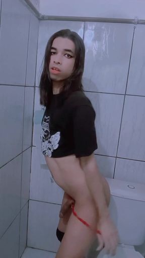 Shemale Slut and Shameless, on Her Knees Sucking Two Cocks at the Same Time