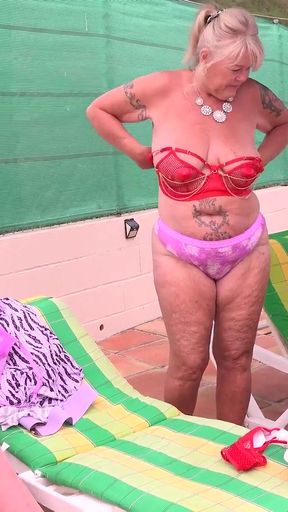 Thrilling moment from &quot;AuntJudysXXX - Busty Mature MILFs Melody Charm, Randy Raz, and JoJo Robinson Gets Naughty by the Pool&quot;
