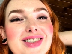Redheaded amateur MILF with a sex toy on webcam show