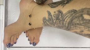 peeing and playing with feet