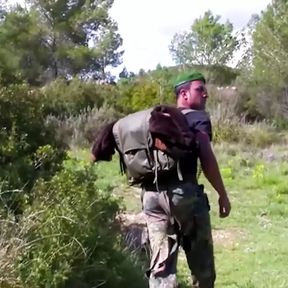 On the Mountain a Redhead Slut Is Riding a Soldier in a Cowgirl Pose