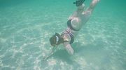Isla Moon Strips Down to Explore the Coral Reef