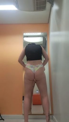 trying on bikinis and panties in the store