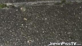 Wicked  Japanese babe is peeing in front of her house