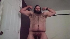 Hairy man flexing for the ladies