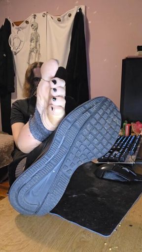 Sniffing my stinky sneakers while showing off my feet