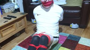 Miss M footballer bound, gagged and struggling escape challenge in red rope