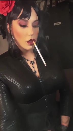 Mrs Dangles long cigarette and naughty eye contact seduces you.....