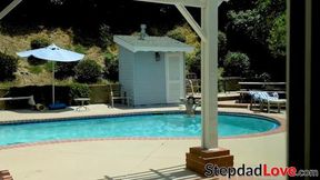 Stepdad drills his young stepdaughter in the living room