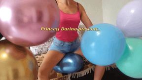 Darina Pops balloons with her ass