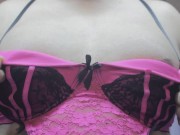 Inflated boobs in a nice pink bra