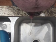 Peeing in mother laws sink