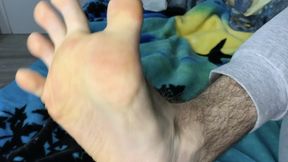 Boy 19 years old shows hairy feet