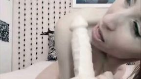 Beautiful blonde hottie with marvelous ass fucks a dildo