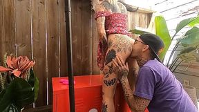 Horny tattooed couple fucking in the backyard