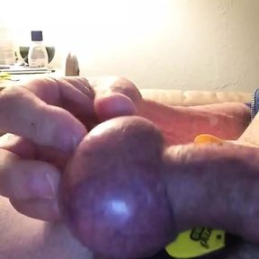 Gently rubbing my penis while in CBT