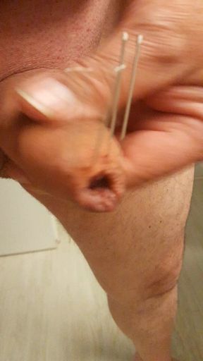 Needles through the foreskin