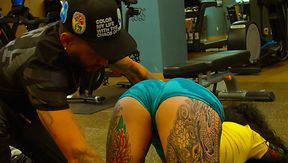 Fitnes couch helps her trainee getting more fit showing one good technique