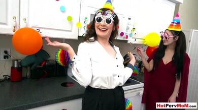 Mature stepmom Melody Mynx and stepsis Tifa Quinn give a birthday blowjob in the kitchen