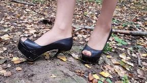 high heels forest walk, high heels sinking in ground, high heels stuck, bending high heels
