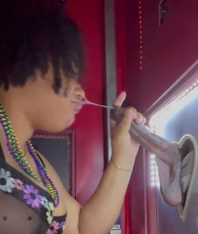 Swingin' couple gets a sloppy blowjob in front of the glory hole