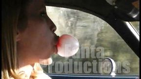 Cassandra Blowing Bubbles While Driving