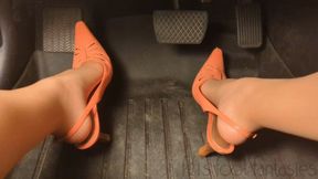 Fifi pedal pumping in pink back-strap heels with nylons