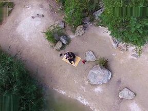 Nude beach sex, taken by a drone