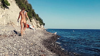 Young Russian nudist girl gets fucked on public beach