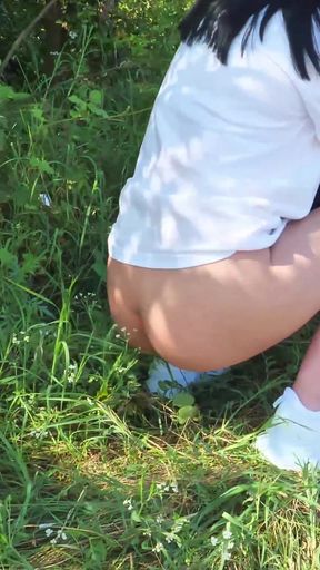 Sexy Brunette Trying Hard to Empty Her Bladder Outside, Then Quick Pee Next to a House in Construction
