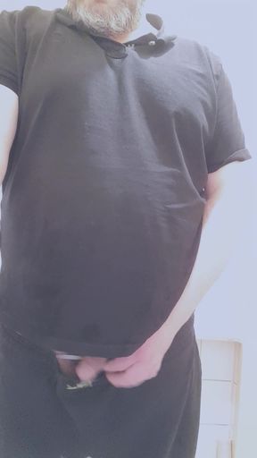 bear smoking and taking a long piss